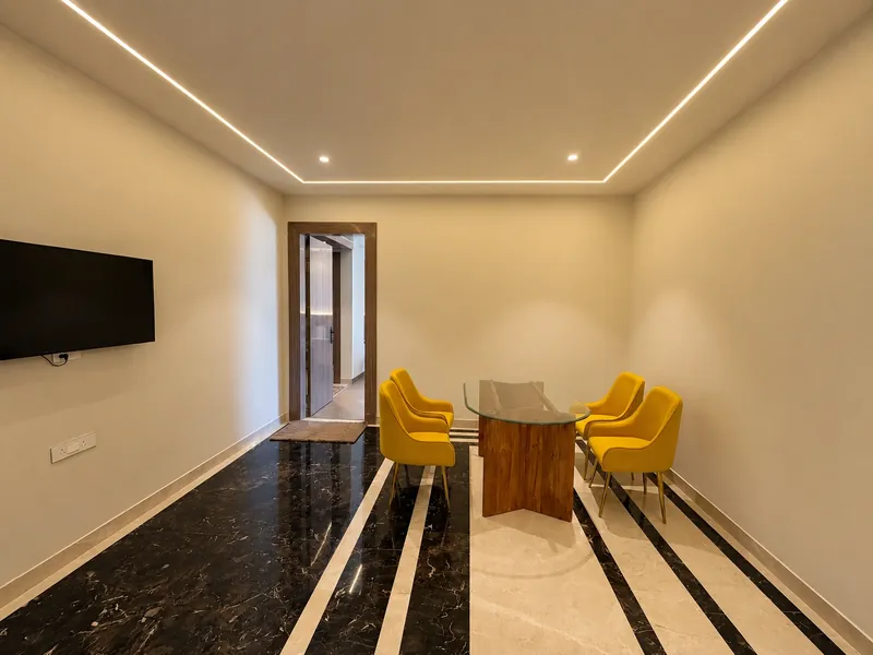 Meeting Room: a small conference space finished in marble and brass-legged seating. Hotel Silk by Resham, Murthal, Haryana.