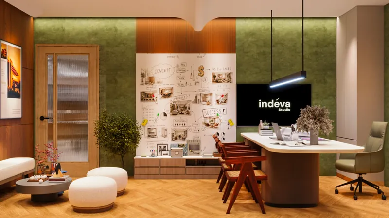 Pin-up Wall & TV: the pin-up board and TV face the table, so drawings can be discussed right there. Indéva Studio Office, Narela.