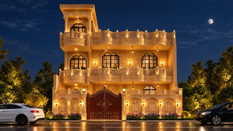 Facade at Night: warm light picks out the arches, balconies and carved stone after dark. Villa Project, Narela, Delhi.