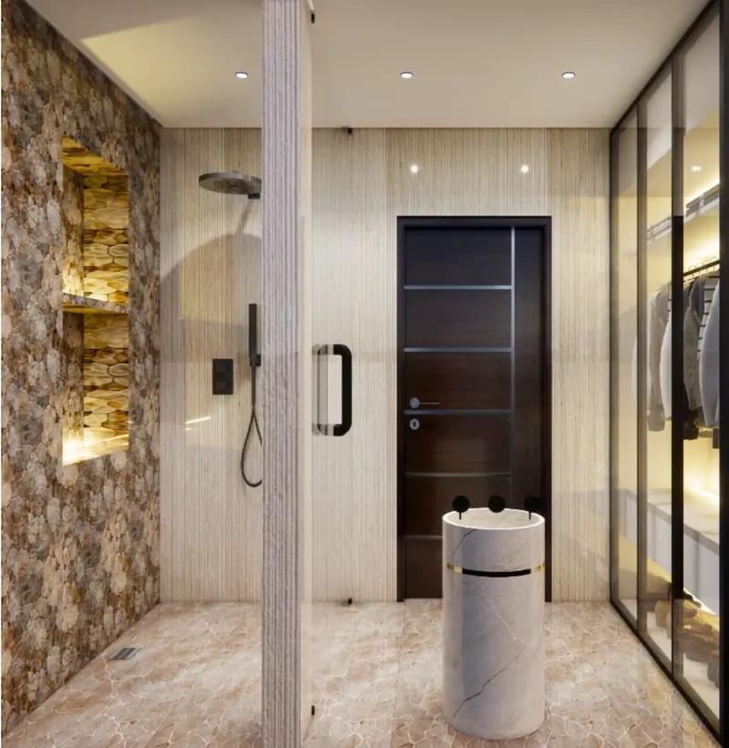 Son's Washroom: a stone pedestal basin, textured feature wall and glass-fronted wardrobe. Villa Project, Narela, Delhi.